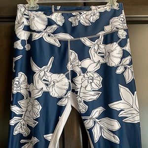 All fenix Australian brand floral leggings with white inside thigh stripe